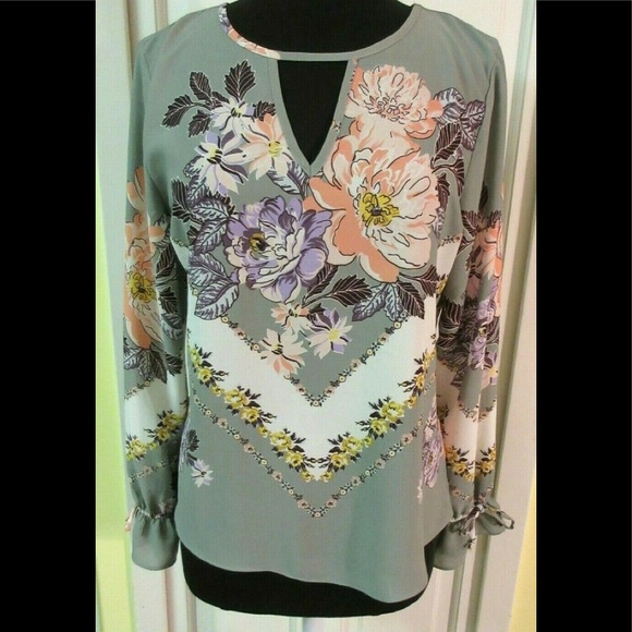 Maurices Tops - Maurices floral top / blouse floral sz Medium